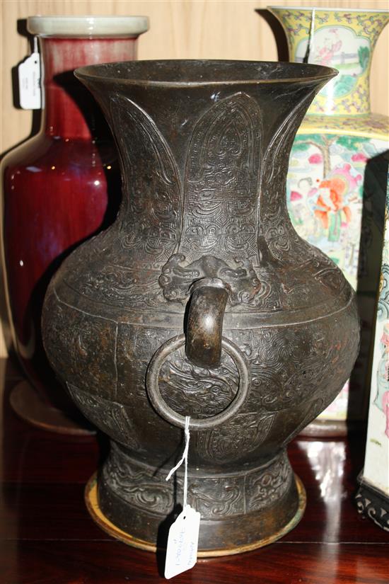 A large Chinese archaistic bronze vase, Hu, Ming dynasty, 38cm, old repairs